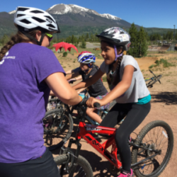 SOS Outreach youth learning to mountain bike