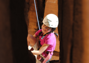 CNM Rock Climber on an SOS Outreach trip