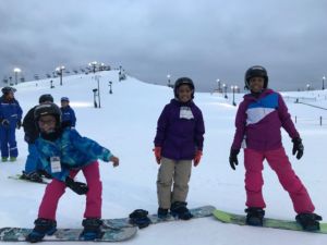 Happy girls on the snow